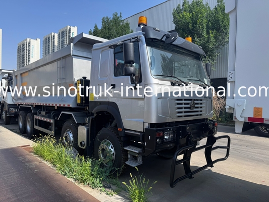 SINOTRUK HOWO 371HP 8x4 รถดั๊มพ์ Tipper สำหรับงานก่อสร้าง รุ่นเก่า หน้าตรง กันชนแบบทหาร สำหรับพื้นที่เหมืองแร่ ไฟเตือนสองดวง ตู้คอนเทนเนอร์แบบ U